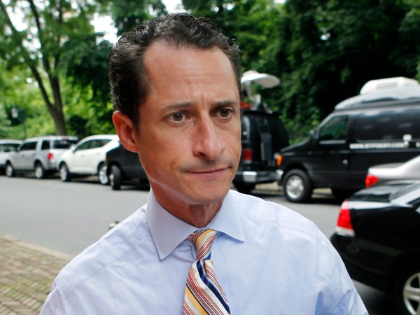 U.S. Rep. Anthony Weiner, D-N.Y., returns to his Forest Hills home after a news conference during which he annouced his intention to resign, Thursday, June 16, 2011, in the Queens borough of New York. Weiner has decided to resign his seat in Congress after a two-week scandal spawned by lewd photos the New York lawmaker took of himself and sent online to numerous women. (AP Photo/Jason DeCrow)