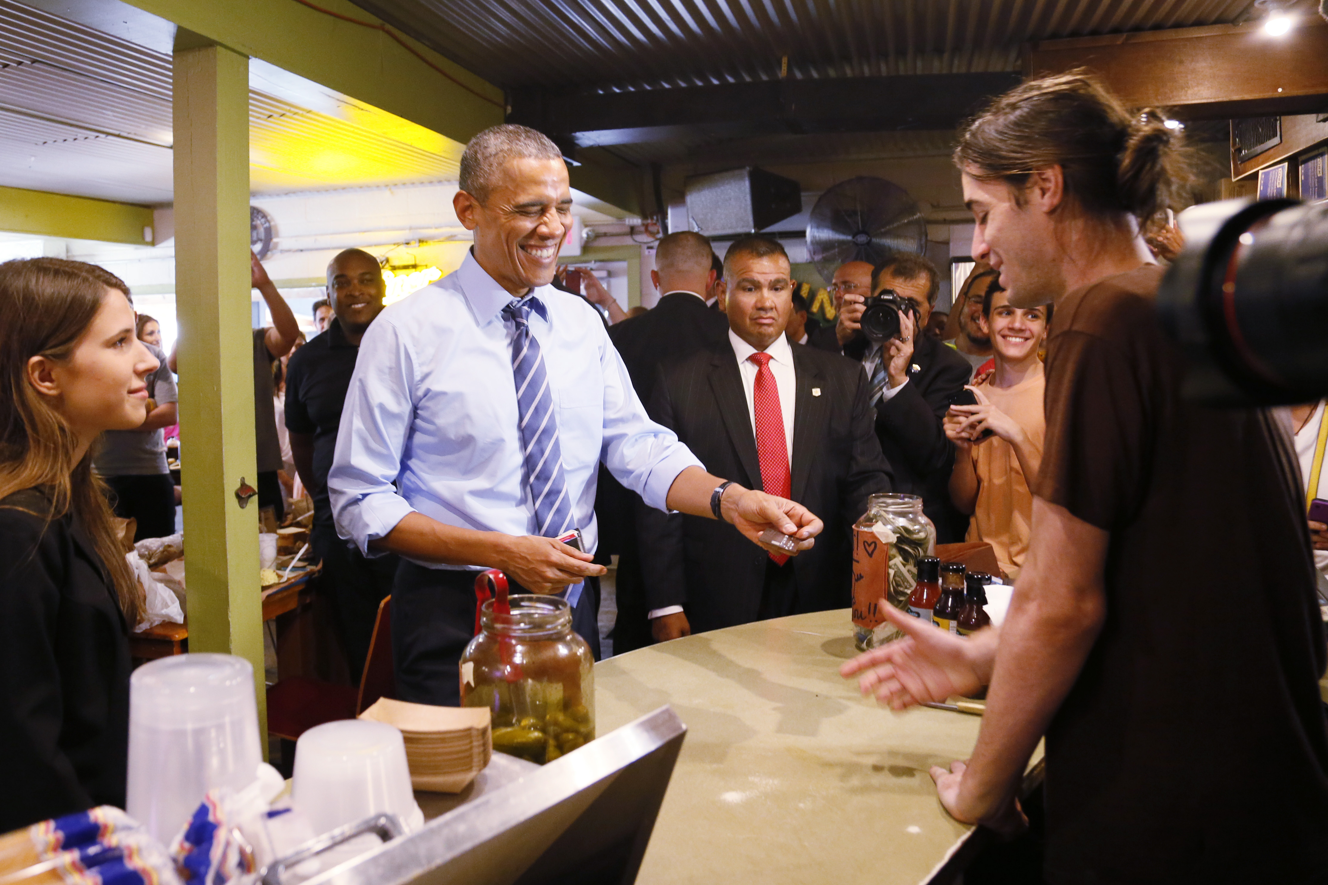 Obama Rewards Texas BBQ Cashiers Gay Rights Joke With A Fist Bump