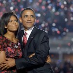 Democratic presidential candidate, Sen. Barack Obama, D-Ill., hugs his wife, Michelle Obama, after giving his acceptance speech at the Democratic National Convention at Invesco Field at Mile High in Denver Thursday, Aug. 28, 2008.(AP Photo/Alex Brandon)