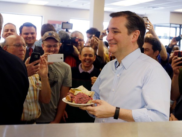 Republican presidential candidate, Sen. Ted Cruz, R-Texas holds his sandwich during a campaign stop at Shapiro's Delicatessen, Thursday, April 21, 2016, in Indianapolis. (AP Photo/Darron Cummings)