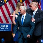 Republican presidential candidate Donald Trump, right, walks with Gov. Mike Pence, R-Ind., during a campaign event to announce Pence as the vice presidential running mate on, Saturday, July 16, 2016, in New York. (AP Photo/Evan Vucci)