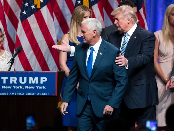 Republican presidential candidate Donald Trump, right, walks with Gov. Mike Pence, R-Ind., during a campaign event to announce Pence as the vice presidential running mate on, Saturday, July 16, 2016, in New York. (AP Photo/Evan Vucci)