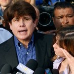 FILE - In this March 14, 2012, file photo, former Illinois Gov. Rod Blagojevich speaks to the media outside his home in Chicago as his wife, Patti, wipes away tears a day before he was to report to a prison after his conviction on corruption charges. On Monday, July 25, 2016, federal prosecutors said statements Blagojevich has made prove he isn't "deserving of leniency." A resentencing hearing is scheduled next month for Blagojevich, who is hoping a federal judge will give him a five-year sentence instead of his original 14 years. (AP Photo/M. Spencer Green, File)