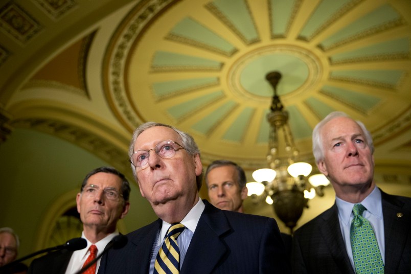 Sen. John Barrasso, R-Wyo., left, Majority Leader Mitch McConnell, from Kentucky, Sen. John Thune, R-S.D., and Republican Whip Sen. John Cornyn, R-Texas, listen to a question after their policy luncheon, on Capitol Hill, Tuesday, June 21, 2016 in Washington. (AP Photo/Alex Brandon)