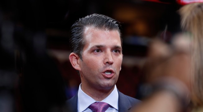 Donald Trump Jr., son of of Republican Presidential Candidate Donald Trump, talks to reporters after his sound check before the start of the second day session of the Republican National Convention in Cleveland, Tuesday, July 19, 2016. (AP Photo/Carolyn Kaster)