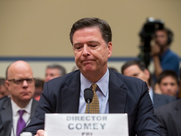 FBI Director James Comey testifies under oath before the House Oversight Committee to explain his agency's recommendation to not prosecute Hillary Clinton, now the Democratic presidential candidate, over her private email setup during her time as secretary of state, on Capitol Hill in Washington, Thursday, July 7, 2016. (AP Photo/J. Scott Applewhite)