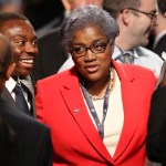 Democratic party chairperson Donna Brazile talks with audience members before the debate between Republican vice-presidential nominee Gov. Mike Pence and Democratic vice-presidential nominee Sen. Tim Kaine at Longwood University in Farmville, Va., Tuesday, Oct. 4, 2016. (Joe Raedle/Pool via AP)