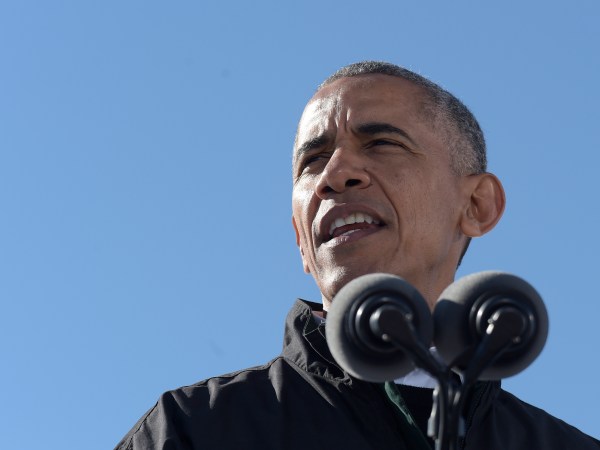 President Barack Obama speaks at a Hillary for America campaign event at the Cleveland Burke Lakefront Airport in Cleveland, Ohio, Friday, Oct. 14, 2016.  (AP Photo/Susan Walsh)
