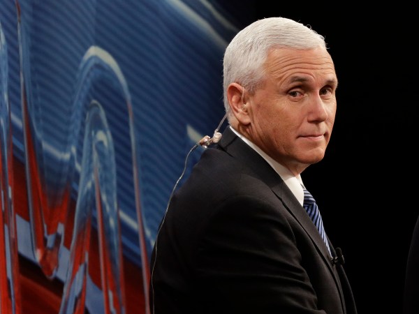 Republican vice-presidential nominee Gov. Mike Pence looks down at the debate floor from a television booth before the start of the third and final presidential debate between Democratic presidential nominee Hillary Clinton Republican presidential nominee Donald Trump in Las Vegas, Wednesday, Oct. 19, 2016. (AP Photo/John Locher)