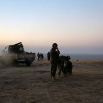 Kurdish security forces take up a position as they fight overlooking the Islamic State-controlled in villages surrounding Mosul, in Khazer, about 30 kilometers (19 miles) east of Mosul, Iraq, Monday, Oct. 17, 2016. Iraqi government and Kurdish forces, backed by U.S.-led coalition air and ground support, launched coordinated military operations early on Monday as the long-awaited fight to wrest the northern city of Mosul from Islamic State fighters got underway.(AP Photo)