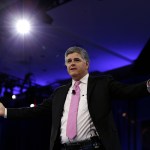 In this March 4, 2016, photo, Sean Hannity of Fox News arrives in National Harbor, Md. Hannity is getting a bruising reminder that this year's presidential campaign defies traditional political rules. The Fox News Channel and radio host had a nasty spat with Ted Cruz this week, following criticism from both the left and right about his interviews with Donald Trump. (AP Photo/Carolyn Kaster)
