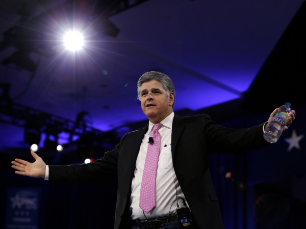 In this March 4, 2016, photo, Sean Hannity of Fox News arrives in National Harbor, Md. Hannity is getting a bruising reminder that this year's presidential campaign defies traditional political rules. The Fox News Channel and radio host had a nasty spat with Ted Cruz this week, following criticism from both the left and right about his interviews with Donald Trump. (AP Photo/Carolyn Kaster)
