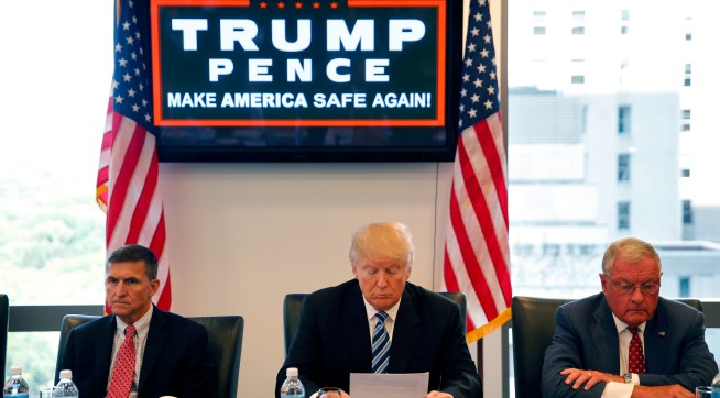 Republican presidential candidate Donald Trump, conducts a roundtable discussion on national security in his offices in Trump Tower in New York, Wednesday, Aug. 17, 2016. Left is Ret. Army Gen. Mike Flynn and right is Ret. Army Lt. Gen. Keith Kellogg. (AP Photo/Gerald Herbert)