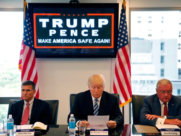 Republican presidential candidate Donald Trump, conducts a roundtable discussion on national security in his offices in Trump Tower in New York, Wednesday, Aug. 17, 2016. Left is Ret. Army Gen. Mike Flynn and right is Ret. Army Lt. Gen. Keith Kellogg. (AP Photo/Gerald Herbert)
