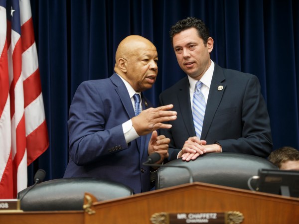 Rep. Jason Chaffetz, R-Utah, chairman of the House Oversight and Government Reform Committee, right, confers with Rep. Elijah Cummings, D-Md., the ranking member, left, just before the start of a hearing with FBI Director James Comey who was called to explain the agency's recommendation to not prosecute Hillary Clinton, now the Democratic presidential candidate, over her private email setup, on Capitol Hill in Washington, Thursday, July 7, 2016. (AP Photo/J. Scott Applewhite)