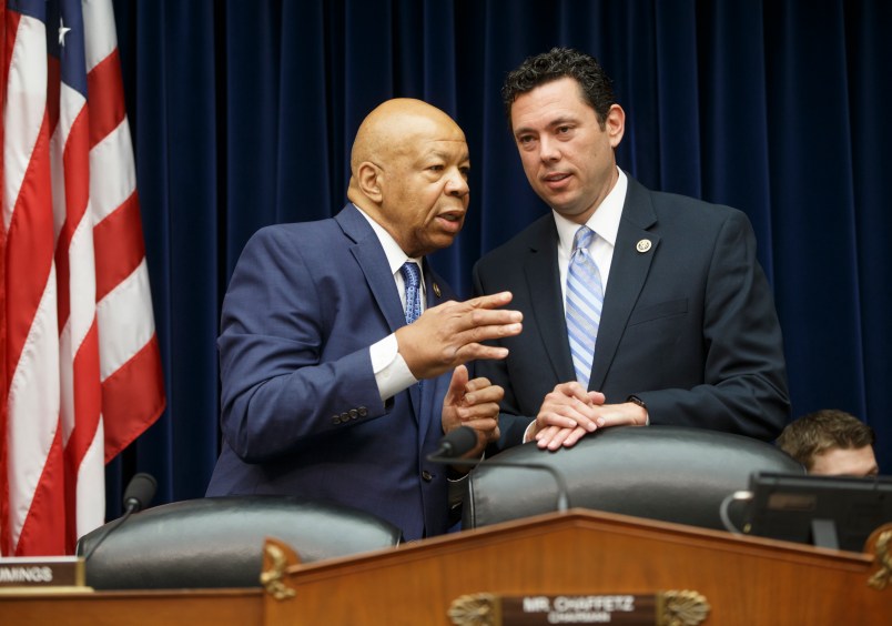 Rep. Jason Chaffetz, R-Utah, chairman of the House Oversight and Government Reform Committee, right, confers with Rep. Elijah Cummings, D-Md., the ranking member, left, just before the start of a hearing with FBI Director James Comey who was called to explain the agency's recommendation to not prosecute Hillary Clinton, now the Democratic presidential candidate, over her private email setup, on Capitol Hill in Washington, Thursday, July 7, 2016. (AP Photo/J. Scott Applewhite)