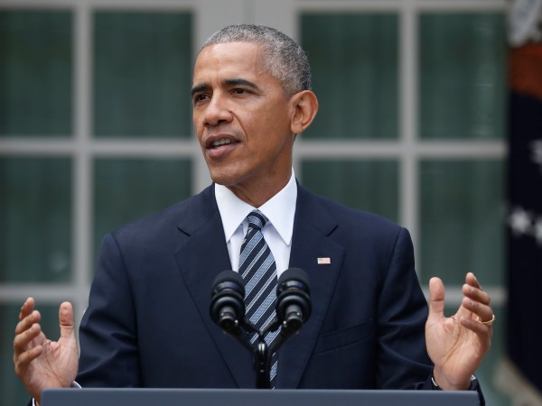 President Barack Obama, accompanied by Vice President Joe Biden, speaks in the Rose Garden of the White House in Washington, Wednesday, Nov. 9, 2016. (AP Photo/Pablo Martinez Monsivais)