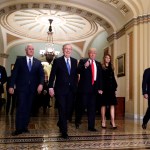 Vice president-elect Mike Pence, second from  left, Senate Majority Leader Mitch McConnell, of Kentucky, President-elect Donald Trump, giving a thumbs up, and Milania Trump walk to a meeting on Capitol Hill, Thursday, Nov. 10, 2016 in Washington. (AP Photo/Alex Brandon)
