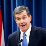 Governor-elect Roy Cooper holds a press conference to complain about efforts by Republicans to cut the power of the Governor's office during the special session of the General Assembly that is going on a few blocks away on Thursday, Dec. 15, 2016.