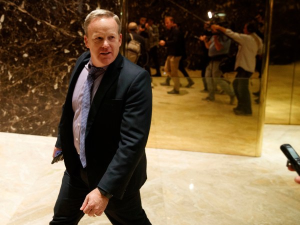 RNC communications director and chief strategist Sean Spicer leaves Trump Tower, Sunday, Nov. 13, 2016, in New York. (AP Photo/ Evan Vucci)