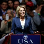 Betsy DeVos, selected for Education Secretary by President-elect Donald Trump speaks during a rally, in Grand Rapids, Mich., Friday, Dec. 9, 2016. (AP Photo/Paul Sancya)
