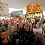 Protesters gather at San Francisco International Airport to denounce President Donald Trump's executive order that bars citizens of seven predominantly Muslim-majority countries from entering the U.S.  Saturday, Jan. 28, 2017, in San Francisco.  (AP Photo/Marcio Jose Sanchez)