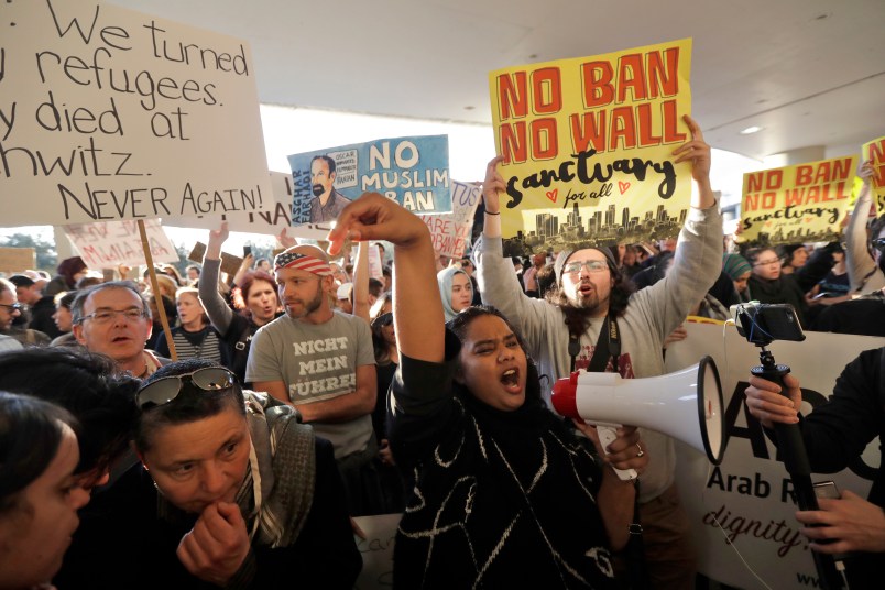 Protesters gather at San Francisco International Airport to denounce President Donald Trump's executive order that bars citizens of seven predominantly Muslim-majority countries from entering the U.S.  Saturday, Jan. 28, 2017, in San Francisco.  (AP Photo/Marcio Jose Sanchez)