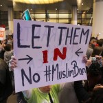 People opposed to President Donald Trump's executive orders barring entry to the U.S. by Muslims from certain countries demonstrate at the Tom Bradley International Terminal at Los Angeles International Airport Saturday, Jan. 28, 2017. (AP Photo/Reed Saxon)