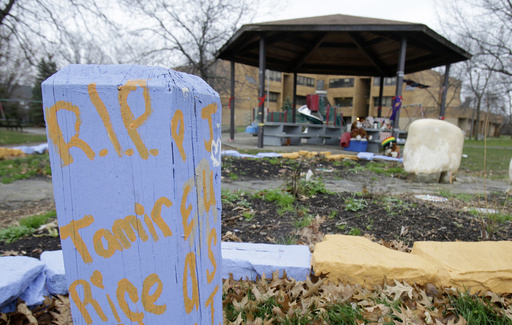 FILE – In this Dec. 29, 2015, file photo, "R.I.P. Tamir Rice" is written on a wooden post near a makeshift memorial at the gazebo where a white patrol officer fatally shot the boy on Nov. 22, 2014, outside the Cudell Recreation Center in Cleveland. A disciplinary hearing for 911 dispatcher Constance Hollinger took place Friday, Feb. 24, 2017, with Hollinger facing possible suspension for up to 10 days on internal disciplinary charges she failed to relay that a 911 caller reporting “a guy” pointing a gun said the male could be a juvenile and the gun might be a “fake.” (AP Photo/Tony Dejak, File)