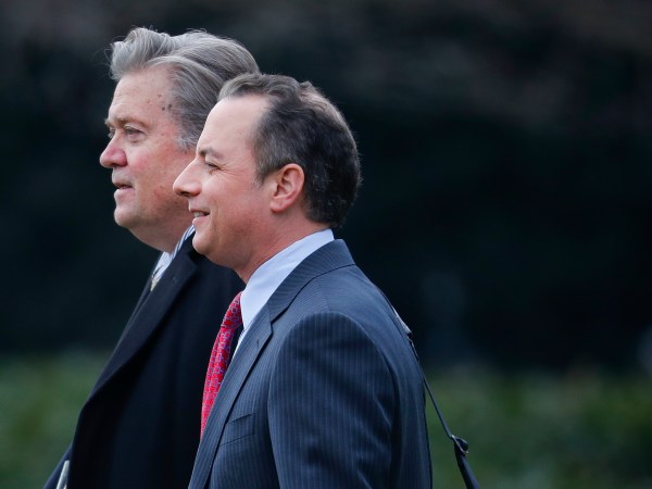 Chief White House Strategist Steve Bannon, left, walks with White House Chief of Staff Reince Priebus, right, to Marine One on the South Lawn of the White House in Washington, Friday, Feb. 17, 2017. (AP Photo/Pablo Martinez Monsivais)