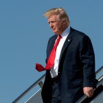 President Donald Trump walks down the steps of Air Force One as he arrives a Palm Beach International Airport in West Palm Beach, Fla., Friday, Feb. 17, 2017. Trump is spending a third weekend in a row at his Mar-a-Lago estate. (AP Photo/Susan Walsh)