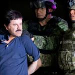 FILE - In this Jan. 8, 2016 file photo, a handcuffed Joaquin "El Chapo" Guzman is made to face the press as he is escorted to a helicopter by Mexican soldiers and marines at a federal hangar in Mexico City. Mexican President Enrique Pena Nieto announced Guzman was recaptured six months after escaping from a maximum security prison. (AP Photo/Eduardo Verdugo, File)