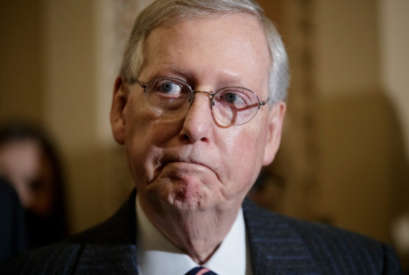 Senate Majority Leader Mitch McConnell, R-Ky., listens during a news conference after the Senate confirmed President Donald Trump's controversial education secretary nominee, Betsy DeVos, on Capitol Hill in Washington, Tuesday, Feb. 7, 2017. DeVos was approved by the narrowest of margins, with Vice President Mike Pence breaking a 50-50 tie in a historic vote. (AP Photo/J. Scott Applewhite)