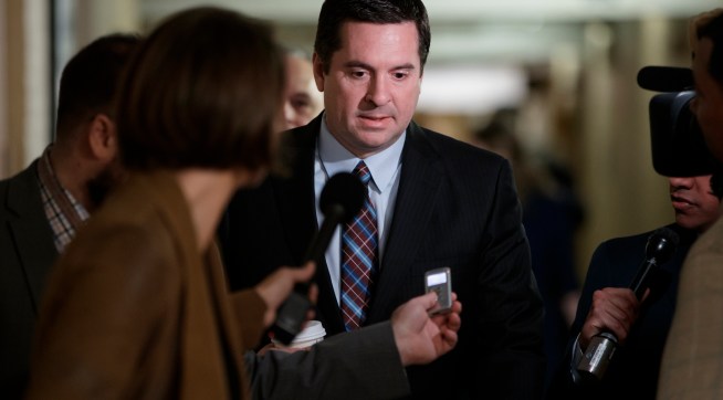 House Intelligence Committee Chairman Devin Nunes, R-Calif., is pursued by reporters as he arrives for a weekly meeting of the Republican Conference with House Speaker Paul Ryan and the GOP leadership, at the Capitol, in Washington, Tuesday, March 28, 2017. (AP Photo/J. Scott Applewhite)