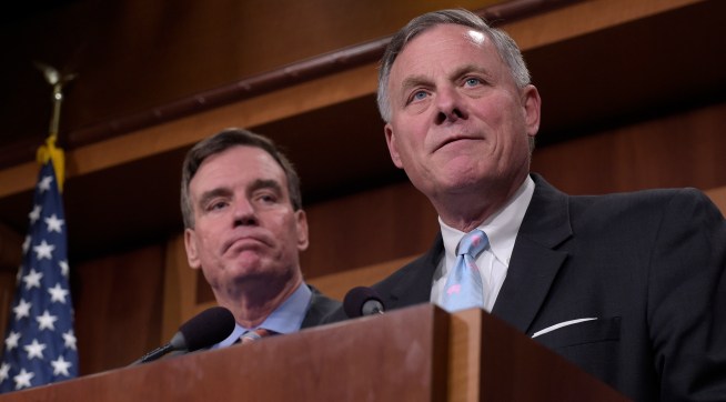 Senate Select Committee on Intelligence Chairman Sen. Richard Burr, R-N.C., and Vice Chairman Sen. Mark Warner, D-Va., speak during a news conference on Capitol Hill in Washington, Wednesday, March 29, 2017, on the Committee's investigation of Russian interference in the 2016 election. (AP Photo/Susan Walsh)