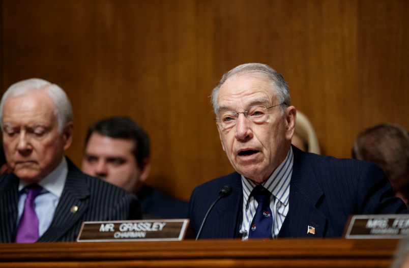 Senate Judiciary Committee Chairman Chuck Grassley, R-Iowa, joined at left by Sen. Orrin Hatch, R-Utah, opens a confirmation hearing for federal prosecutor Rod Rosenstein to be deputy attorney and Rachel Brand to be associate attorney general, on Capitol Hill in Washington, Tuesday, March 7, 2017. (AP Photo/J. Scott Applewhite)