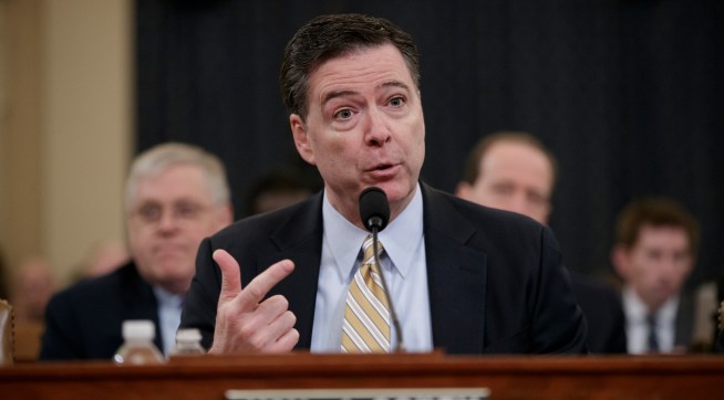 FBI Director James Comey testifies as the House Permanent Select Committee on Intelligence holds its first public hearing on allegations of Russian interference in the 2016 U.S. presidential election and the murky web of contacts between President Donald Trump's campaign and Russia, on Capitol Hill in Washington, Monday, March 20, 2017. (AP Photo/J. Scott Applewhite)