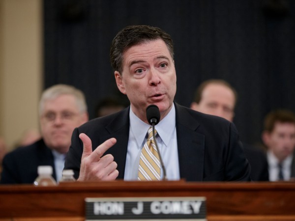 FBI Director James Comey testifies as the House Permanent Select Committee on Intelligence holds its first public hearing on allegations of Russian interference in the 2016 U.S. presidential election and the murky web of contacts between President Donald Trump's campaign and Russia, on Capitol Hill in Washington, Monday, March 20, 2017. (AP Photo/J. Scott Applewhite)