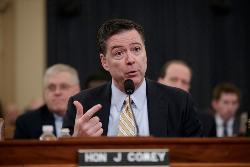 FBI Director James Comey testifies as the House Permanent Select Committee on Intelligence holds its first public hearing on allegations of Russian interference in the 2016 U.S. presidential election and the murky web of contacts between President Donald Trump's campaign and Russia, on Capitol Hill in Washington, Monday, March 20, 2017. (AP Photo/J. Scott Applewhite)