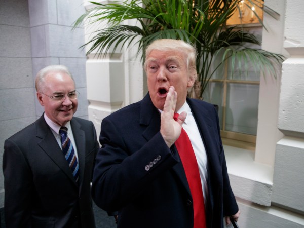 President Donald Trump, joined by Health and Human Services Secretary Tom Price, arrives at the Capitol to rally support for the Republican health care overhaul by taking his case directly to GOP lawmakers two days before the House plans a climactic vote that poses an important early test for his presidency, in Washington, Tuesday, March 21, 2017. (AP Photo/J. Scott Applewhite)