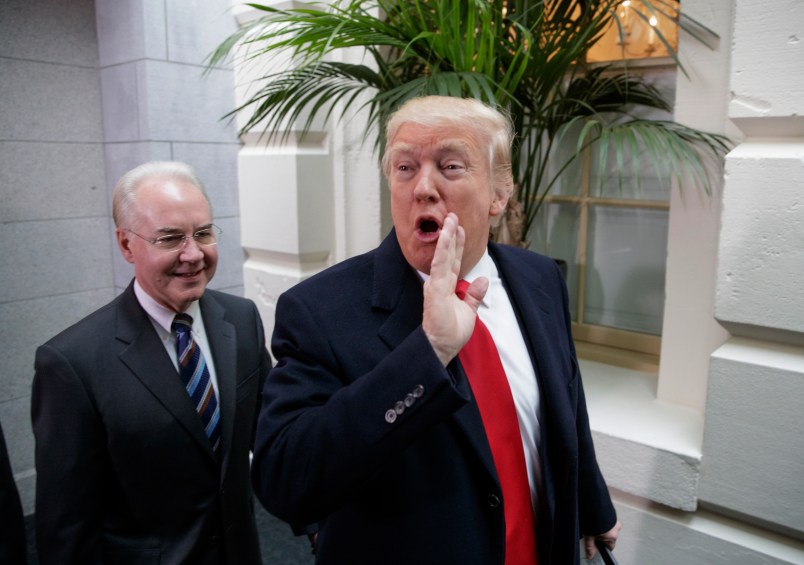 President Donald Trump, joined by Health and Human Services Secretary Tom Price, arrives at the Capitol to rally support for the Republican health care overhaul by taking his case directly to GOP lawmakers two days before the House plans a climactic vote that poses an important early test for his presidency, in Washington, Tuesday, March 21, 2017. (AP Photo/J. Scott Applewhite)