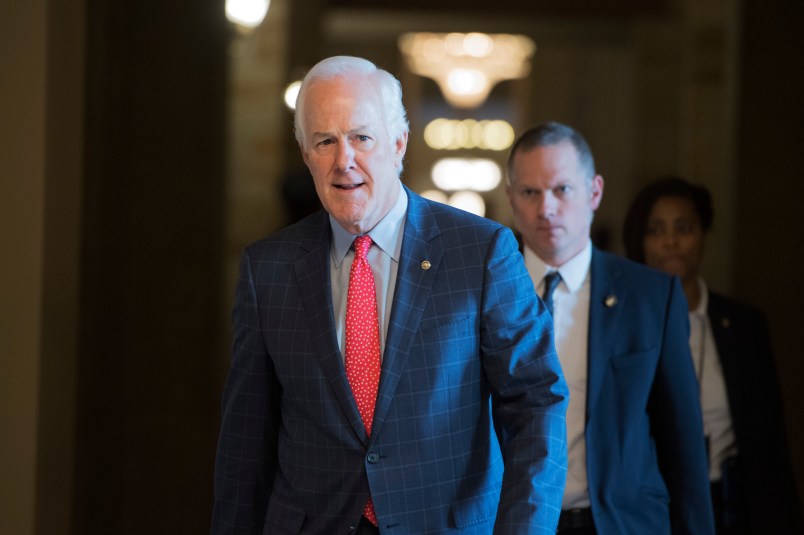 UNITED STATES - FEBRUARY 08: Senate Majority Whip John Cornyn, R-Texas, makes his way to a Senate Republican luncheon in the Capitol. (Photo By Tom Williams/CQ Roll Call)