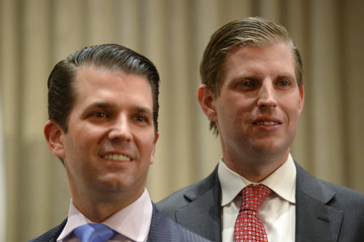 FILE- In this Feb. 28, 2017 file photo, Donald Trump Jr., left, and his brother Eric attend the grand opening of the Trump International Hotel and Tower in Vancouver, B.C., Canada. Apprentices no more, Eric and Donald Trump Jr. are now at the helm of the Trump Organization and adjusting to the reality presented by their father’s presidency. (Jonathan Hayward/The Canadian Press via AP, File)