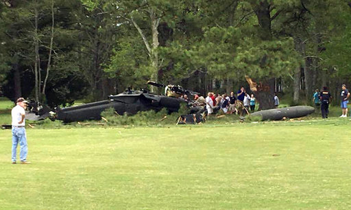 /// These are UGC photos for Helicopter Crash. Given to us with permission from Rebecca Updegrave Cline.Slug: BC-USHelicopter CrashCaption: A crashed military helicopter is seen on the Breton Bay Golf Course in Leonardtown, Maryland, on Monday, April 17, 2017. The U.S. Army said one crew member died and two others were injured in the crash during a routine training flight. (Photo courtesy of Rebecca Updegrave Cline via AP)- Ron