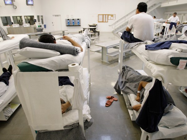 ** ATTENTION HOLD FOR GRAHAM MORRISON ** Detainees are shown resting on bunks inside the "B" cell and bunk unit of the Northwest Detention Center in Tacoma, Wash. Friday, Oct. 17, 2008. The facility is operated by The GEO Group Inc. under contract from U.S. Immigrations and Customs Enforcement, and houses people whose immigration status is in question or who are waiting for deportation or deportation hearings. (AP Photo/Ted S. Warren)