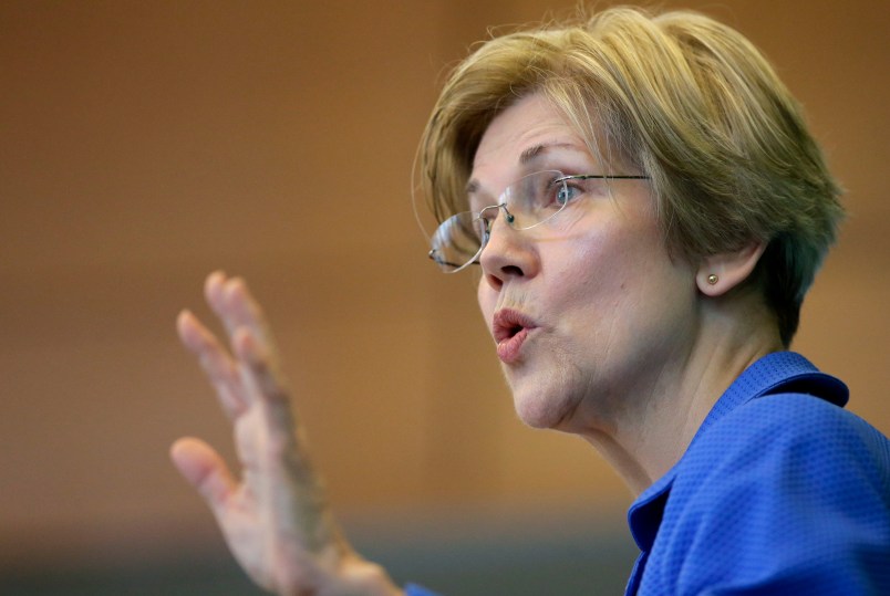 U.S. Sen. Elizabeth Warren, D-Mass., addresses business leaders during a New England Council luncheon at a hotel, Monday, March 27, 2017, in Boston. (AP Photo/Steven Senne)