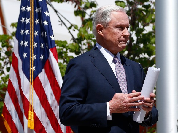 After answering questions, Attorney General Jeff Sessions leaves a press conference after touring the U.S.-Mexico border with border officials Tuesday, April 11, 2017, in Nogales, Ariz.  Sessions announced making immigration enforcement a key Justice Department priority, saying he will speed up deportations of immigrants in the country illegally who were convicted of federal crimes. (AP Photo/Ross D. Franklin)