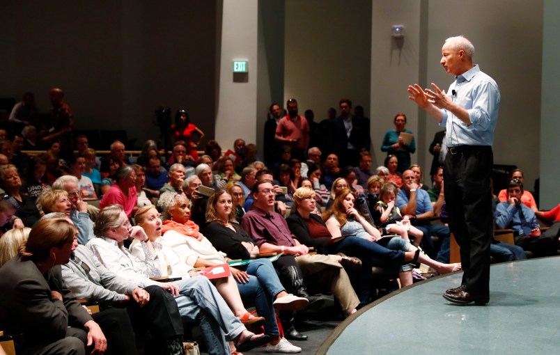 U.S. Rep. Mike Coffman, R-Colo., addresses constituents during a town hall meeting in a hall on the campus of the University of Colorado Medical School late Wednesday, April 12, 2017, in Aurora, Colo. Town halls have become a risky proposition for GOP members of Congress since the election of President Donald Trump. (AP Photo/David Zalubowski)