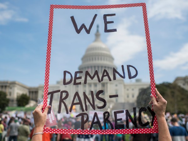 UNITED STATES - APRIL 15: People gather for the Tax March rally on the west lawn of the Capitol to call on President Trump to release his tax returns, April 15, 2017. (Photo By Tom Williams/CQ Roll Call)