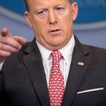 White House press secretary Sean Spicer wears an easter bunny tie as he talks to the media during the daily press briefing at the White House, Monday, April 17, 2017, in Washington. Spicer discussed the president's tax returns, policy on White House visitor logs and other topics. (AP Photo/Andrew Harnik)